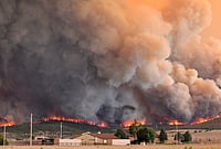 | Photo: Jerilee Bennett/The Gazette via AP : The Aspen Acres fire engulfs a hillside near Beulah, Colorado.