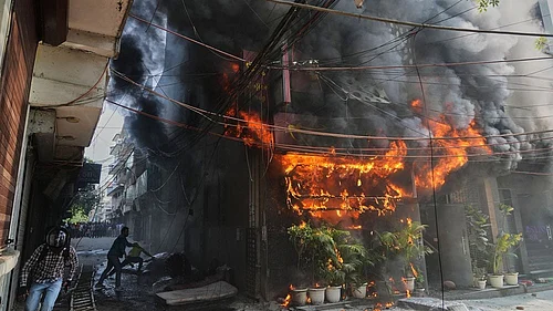 Photo: AP/Manish Swarup; Representative Image : Why Delhis Fire Tragedies Start With Broken Urban Planning, Not Sparks