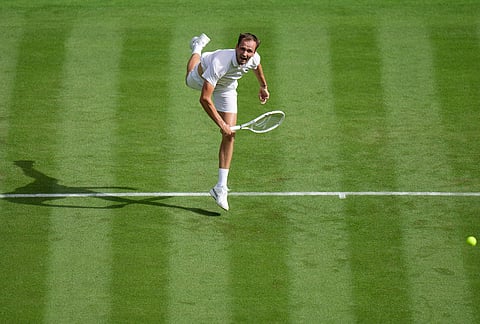 Daniil Medvedev of Russia serves against Marin Cilic of Croatia in their first round men's singles match at the Wimbledon Tennis Championships in London, Monday, June 29, 2026. 