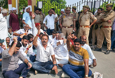 Congress workers stage a protest outside Acharya Narendra Dev University against the alleged house arrest of Uttar Pradesh Congress Committee President Ajay Rai, in Ayodhya, Uttar Pradesh.
