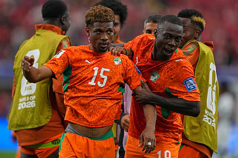 Ivory Coast's Amad Diallo (15) celebrates after scoring his side's opening goal during the World Cup round of 32 soccer match