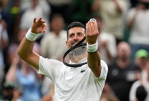 Novak Djokovic of Serbia celebrates winning the men's singles match against Yibing Wu of China at the Wimbledon Tennis Championships in London, Monday, June 29, 2026.
