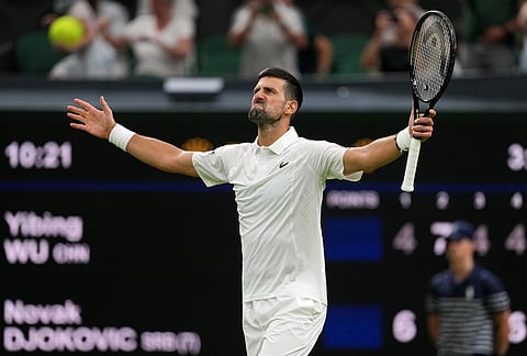 Novak Djokovic of Serbia celebrates winning the men's singles match against Yibing Wu of China at the Wimbledon Tennis Championships in London, Monday, June 29, 2026.