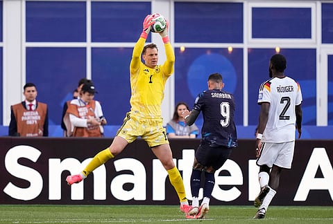 Germany goalkeeper Manuel Neuer makes a save in front of Paraguay's Antonio Sanabria during the World Cup round of 32 soccer match between Germany and Paraguay in Foxborough, Mass., near Boston.