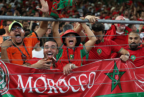 Moroccan fans celebrate after their team won on penalty kicks in the World Cup round of 32 soccer match between the Netherlands and Morocco in Guadalupe, near Monterrey, Mexico.