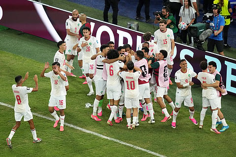 Morocco's Issa Diop (14) celebrates with teammates after scoring their first goal during the World Cup round of 32 soccer match between the Netherlands and Morocco in Guadalupe, near Monterrey, Mexico, Monday, June 29, 2026. 