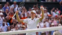 (AP Photo/Kin Cheung) : Jannik Sinner of Italy celebrates winning the men's singles match against Miomir Kecmanovic of Serbia during at the Wimbledon Tennis Championships in London, Monday, June 29, 2026.