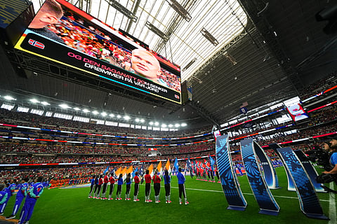 Teams line up prior to the World Cup round of 32 soccer match between Ivory Coast and Norway in Arlington, Texas, 