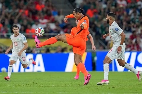 Netherlands' Virgil van Dijk (4) kicks the ball during the World Cup round of 32 soccer match between the Netherlands and Morocco in Guadalupe, near Monterrey, Mexico, Monday, June 29, 2026.