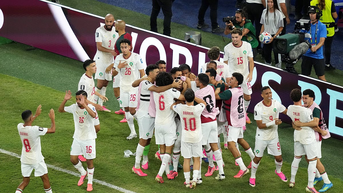 (AP Photo/Moises Castillo) : Moroccos Issa Diop (14) celebrates with teammates after scoring their first goal during the World Cup round of 32 soccer match between the Netherlands and Morocco in Guadalupe, near Monterrey, Mexico, Monday, June 29, 2026.