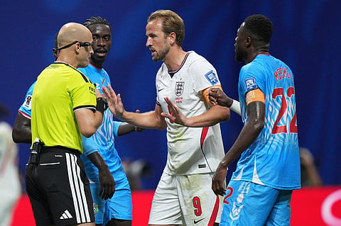 England's Harry Kane (9) reacts to referee Adham Mohammad Tumah Makhadmeh's decision not to award a penalty during the World Cup round of 32 soccer match between England and Congo in Atlanta