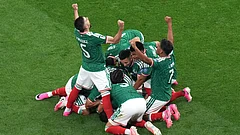 Mexico's Raul Jimenez (9) celebrates with teammates after scoring their second goal during the World Cup round of 32 soccer match between Mexico and Ecuador in Mexico City, Tuesday, June 30, 2026. - AP Photo/Silvia Izquierdo
