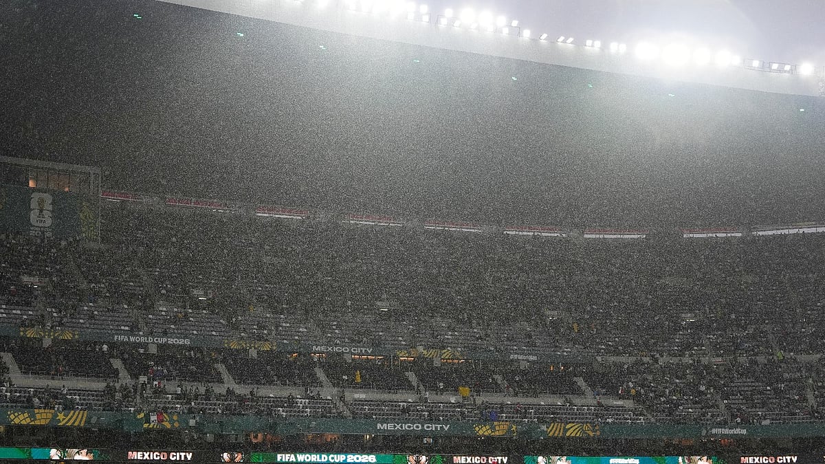 Rain falls as fans wait for the start of the World Cup round of 32 soccer match between Mexico and Ecuador in Mexico City, Tuesday, June 30, 2026.  - AP Photo/Fernando Llano