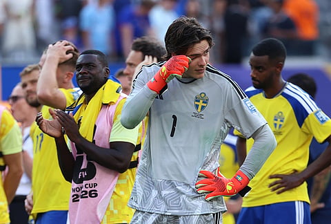 Sweden goalkeeper Jacob Widell Zetterstrom (1) reacts with teammates after the World Cup round of 32 soccer match between France and Sweden in East Rutherford, N.J., near New York, Tuesday, June 30, 2026