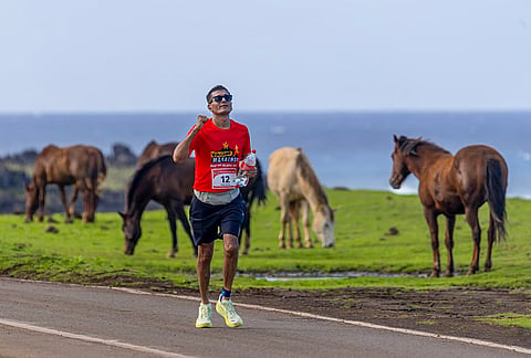 India's Ram Gopal Kothari runs along a coastal road during the Volcano Marathon, in Easter Island, Chile. The Kolkata-based entrepreneur became the first Indian to complete the 42.195-km marathon across the remote Pacific island's volcanic terrain. 