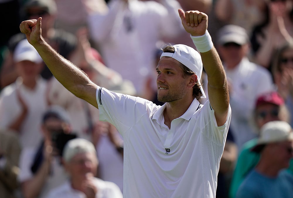 Otto Virtanen of Finland celebrates winning against Ben Shelton of the United States after their men's singles match at the Wimbledon Tennis Championships in London, Tuesday, June 30, 2026. - | Photo: AP/Brian Inganga