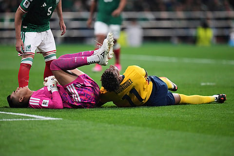Ecuador's Kevin Rodriguez (11), right, reacts next to Mexico goalkeeper Raul Rangel (1) during the World Cup round of 32 soccer match between Mexico and Ecuador in Mexico City, Tuesday, June 30, 2026.