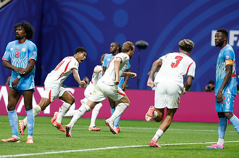 England's Harry Kane, center, celebrates scoring his side's first goal against Congo during the World Cup round of 32 soccer match in Atlanta