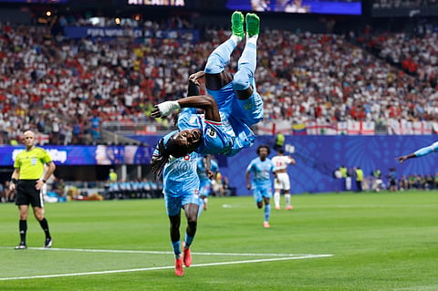 Congo's Brian Cipenga (9) celebrates after scoring their first goal during the World Cup round of 32 soccer match between England and Congo in Atlanta