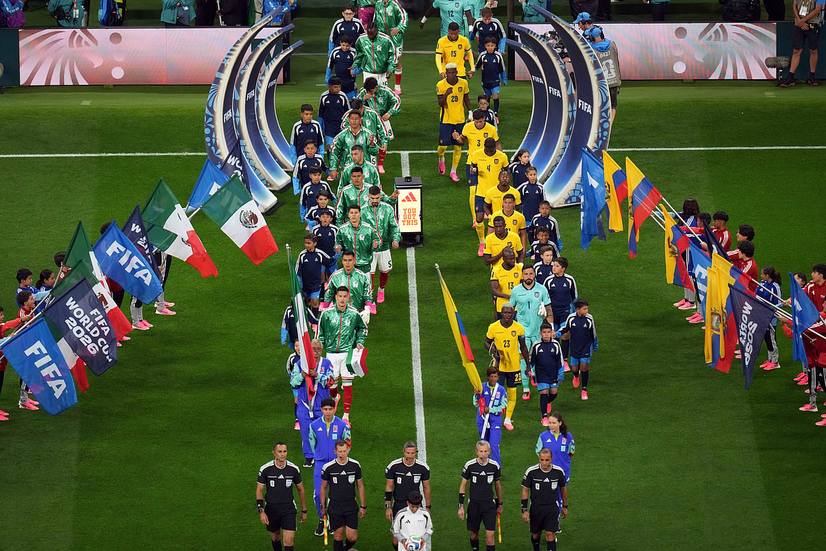 Players and referees enter the field before the World Cup round of 32 soccer match between Mexico and Ecuador in Mexico City, Tuesday, June 30, 2026.  - (AP Photo/Silvia Izquierdo)