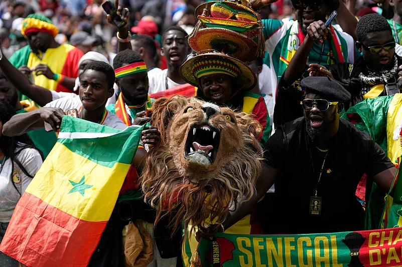 Fans of Senegal cheer prior to the World Cup round of 32 soccer match between Belgium and Senegal in Seattle