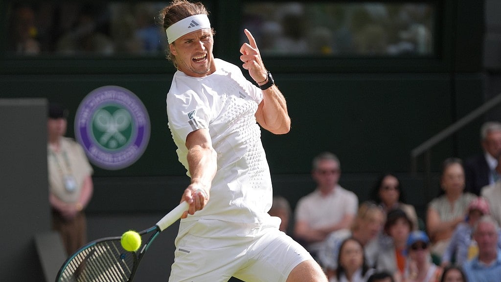 Alexander Zverev of Germany plays a forehand against Alexander Blockx of Belgium in their first round men's singles match at the Wimbledon Tennis Championships in London, Tuesday, June 30, 2026.  - AP Photo/Maja Smiejkowska