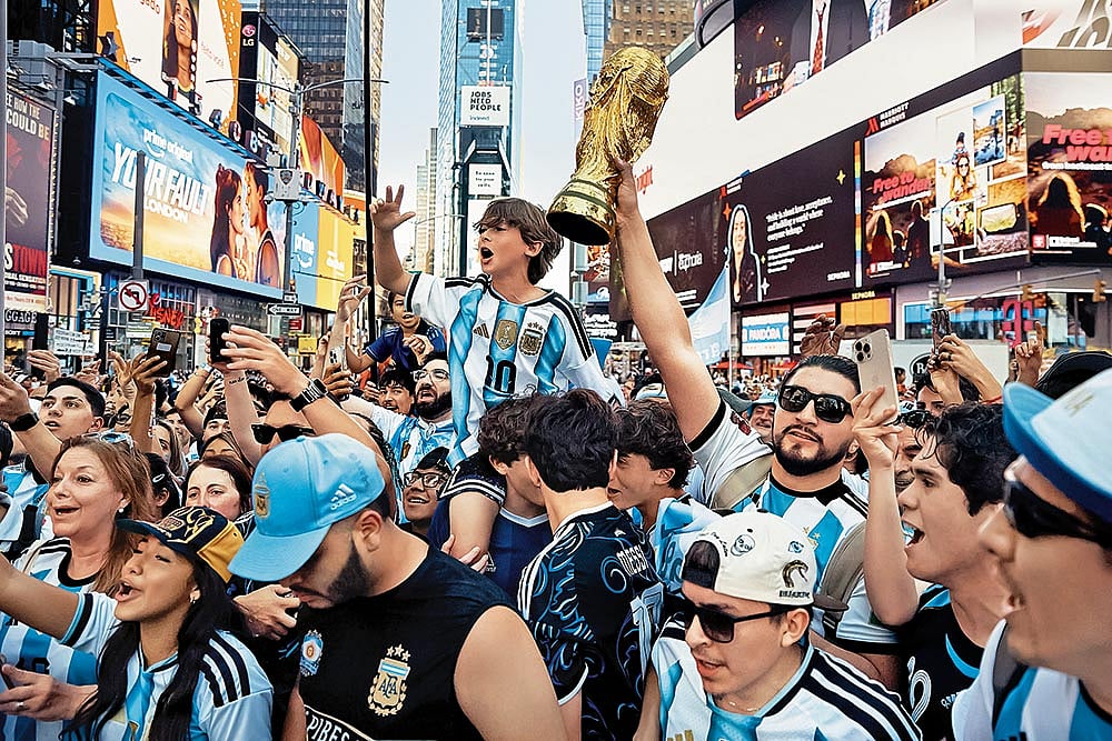 Argentinian fans take part in a pre-match rally in Times Square, New York, on June 15, 2026