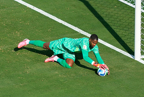 France goalkeeper Mike Maignan (16) makes a save during the World Cup round of 32 soccer match between France and Sweden in East Rutherford, N.J., near New York, Tuesday, June 30, 2026. 
