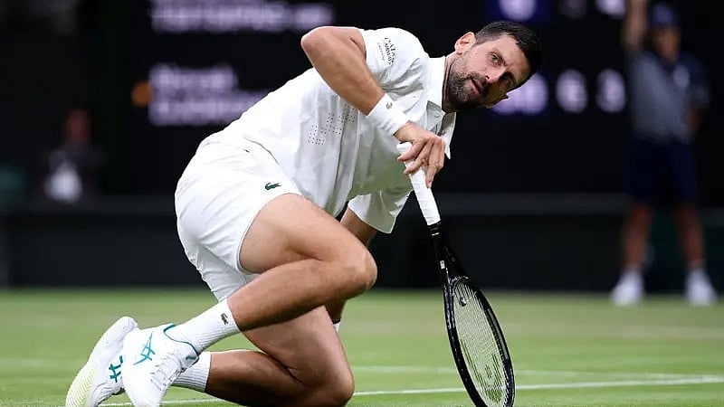 More a tip than a dive, Novak almost twisted his ankle during the second set of the game - GETTY IMAGES