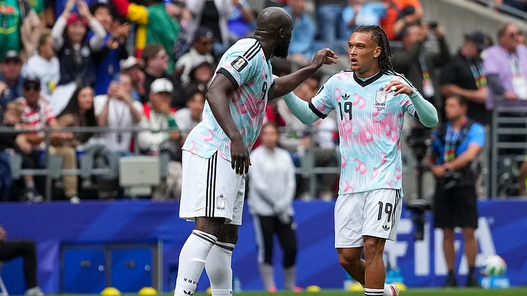 Belgium's Romelu Lukaku (9) celebrates scoring a goal with teammate Diego Moreira (19) during the World Cup round of 32 soccer match between Belgium and Senegal in Seattle - Ted S. Warren/AP Photo