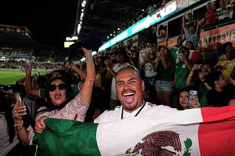 Mexico fans cheer at Shell Energy Stadium, home of the MLS soccer club Houston Dynamo, as they watch a live broadcast in Houston, of a World Cup soccer round of 32 match between Mexico and Ecuador, Tuesday, June 30, 2026.