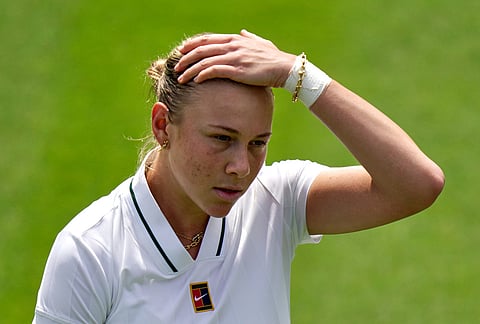 Amanda Anisimova of the United States reacts during the women's singles match against Lina Gjorcheska of North Macedonia at the Wimbledon Tennis Championships in London, Tuesday, June 30, 2026.