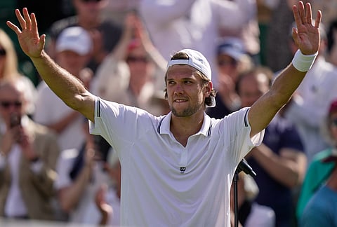 Otto Virtanen of Finland celebrates winning against Ben Shelton of the United States after their men's singles match at the Wimbledon Tennis Championships in London, Tuesday, June 30, 2026.