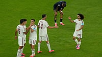 | Photo: AP/Fernando Llano : Spain players celebrate after winning the World Cup Group H soccer match between Uruguay and Spain in Zapopan, near Guadalajara, Mexico.