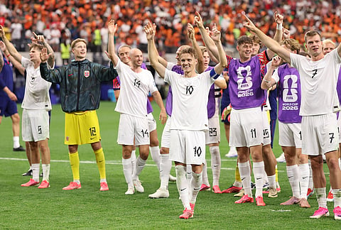 Norway's Martin Oedegaard (10) and teammates celebrate a win during the World Cup round of 32 soccer match between Ivory Coast and Norway in Arlington, Texas, near Dallas, Tuesday, June 30, 2026. 