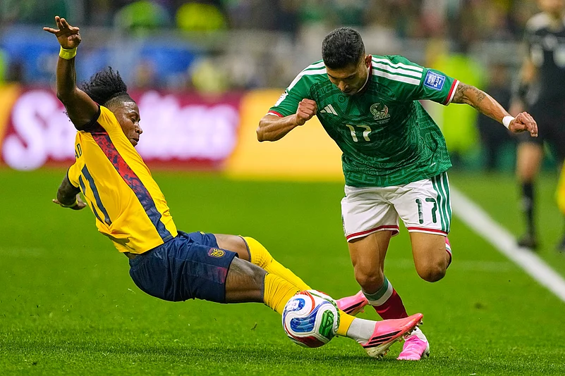 Mexico vs Ecuador FIFA World Cup 2026 Rd 32 Angelo Preciado tackles Orbelin Pineda AP Photo
