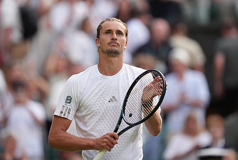 Alexander Zverev of Germany celebrates winning against Alexander Blockx of Belgium in their first round men's singles match, at the Wimbledon Tennis Championships in London, Tuesday, June 30, 2026. 