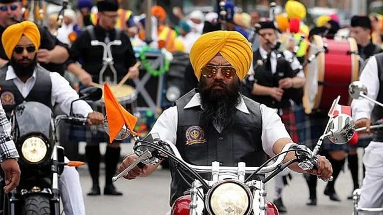 Exemption to Sikhs from Wearing Helmets Not Based on Religion but Reasonable Classification: HC - null