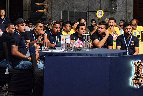 Outer Delhi Warriors' team officials participate in the player auction for the third season of the Delhi Premier League (DPL) T20 cricket, at Aerocity, in New Delhi.