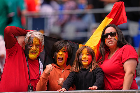 Belgian fans pose before the World Cup round of 32 soccer match between Belgium and Senegal in Seattle.