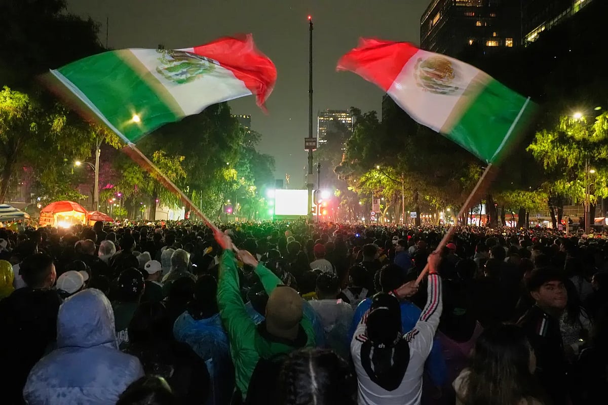All of Mexico City seemed overwhelmed after MEX's qualification to the Round of 16. - AP