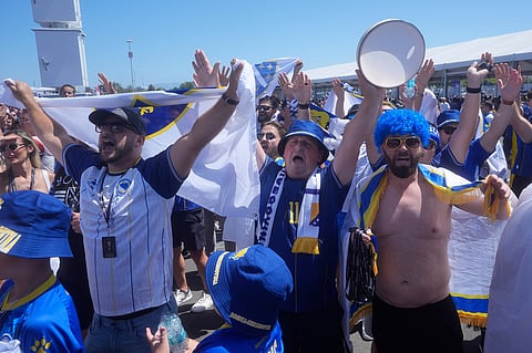 Bosnia fans cheer outside the stadium before the World Cup round of 32 soccer match between the United States and Bosnia in Santa Clara, Calif