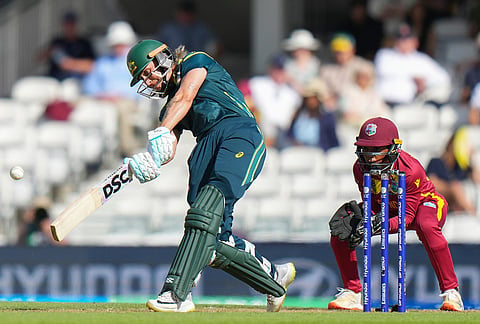 Australia's Ashleigh Gardner hits a six during the Women's T20 Cricket World Cup semifinal between Australia and West Indies in London, Tuesday, June 30, 2026.