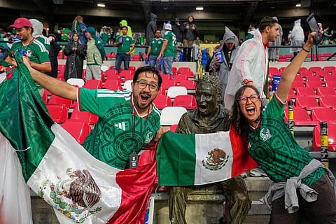 Mexican fans react ahead of the World Cup round of 32 soccer match between Mexico and Ecuador in Mexico City,