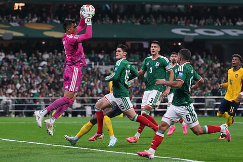 Mexico goalkeeper Raul Rangel (1) catches the ball during the World Cup round of 32 soccer match between Mexico and Ecuador in Mexico City, Tuesday, June 30, 2026.