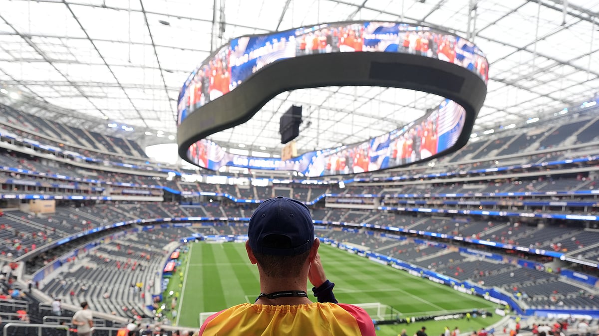 A fan of Spain waits for the World Cup round of 32 soccer match between Spain and Austria in Inglewood, Calif., near Los Angeles, Thursday, July 2, 2026. - (AP Photo/Jae C. Hong)