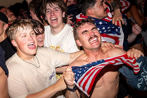 Fans react to the first goal by the United States during a watch party for a World Cup soccer match between the United States and Bosnia, Wednesday, July 1, 2026, in Washington, at the FIFA Fan Zone on the National Mall