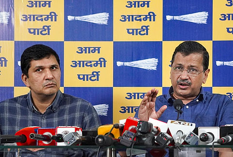 Aam Aadmi Party (AAP) National Convenor Arvind Kejriwal, right, addresses a press conference over alleged irregularities in Ram Mandir donations as party leader Saurabh Bharadwaj listens, at the party office in New Delhi.