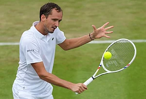 | Photo: AP/Kirsty Wigglesworth : Daniil Medvedev of Russia returns the ball during the second round men's singles match against Daniel Merida of Spain at the Wimbledon Tennis Championships in London, Wednesday, July 1, 2026.