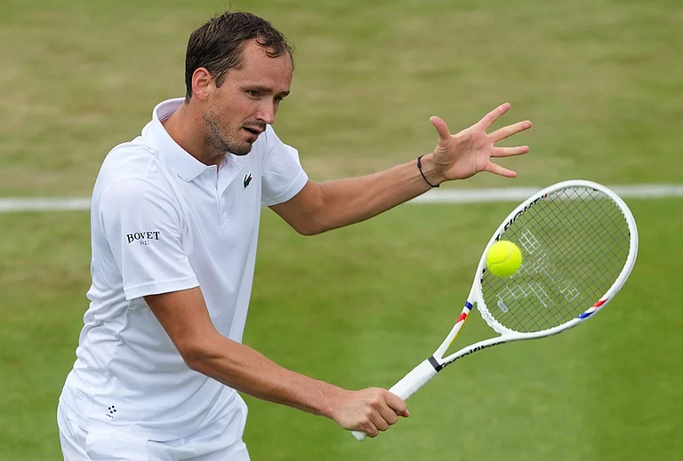 Daniil Medvedev of Russia returns the ball during the second round men's singles match against Daniel Merida of Spain at the Wimbledon Tennis Championships in London, Wednesday, July 1, 2026. - | Photo: AP/Kirsty Wigglesworth